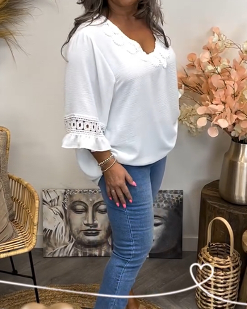 Top met uitlopende mouwen