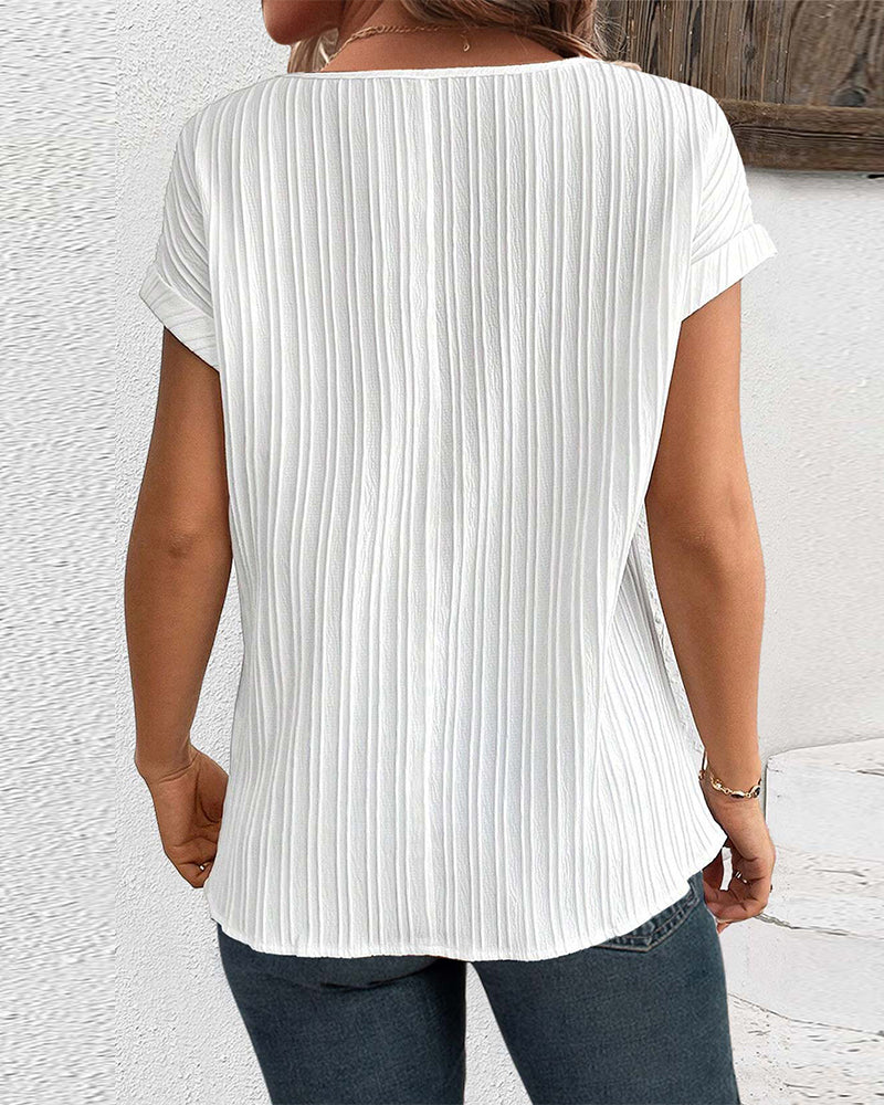 Ribtop met korte mouwen en patchworkprint