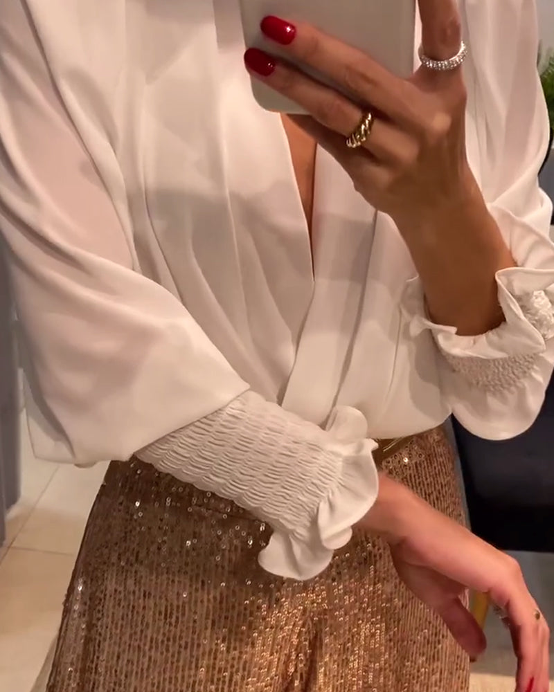 Elegante effen V-hals blouse met lantaarnmouwen