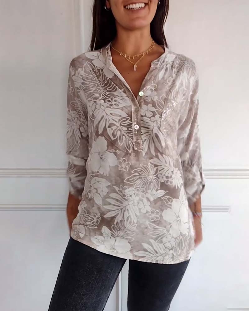 Top met bladprint en patchwork-pailletten