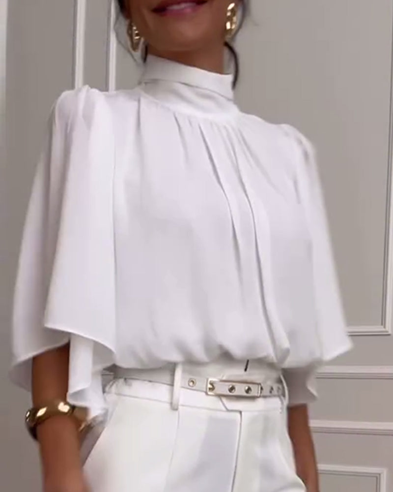 Effen blouse met hoge kraag en vlindermouwen