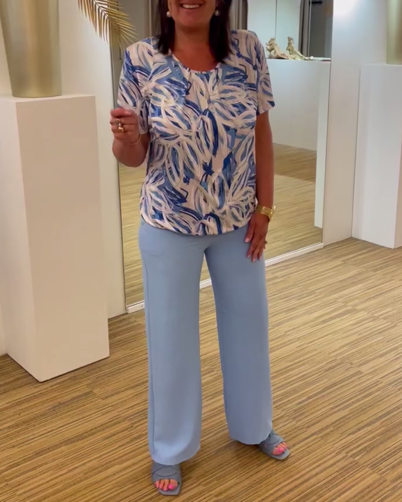 Geplooide blouse met korte mouwen en ronde hals met print