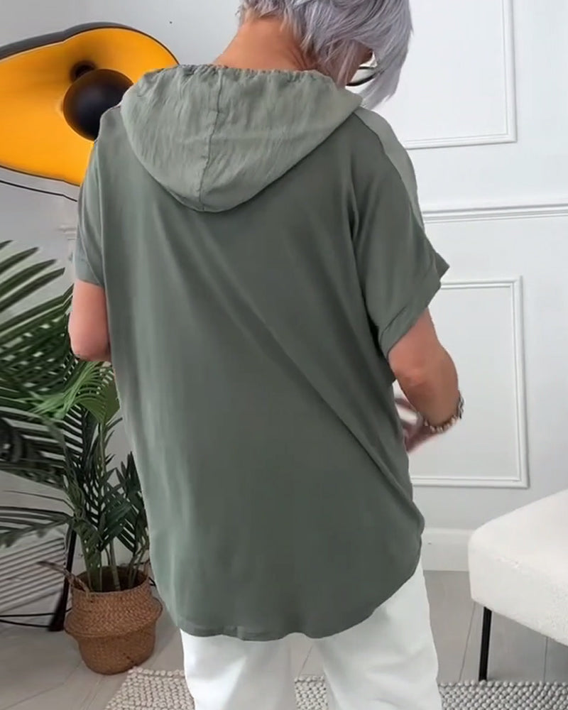 Casual blouse met korte mouwen en bloemenprint met capuchon