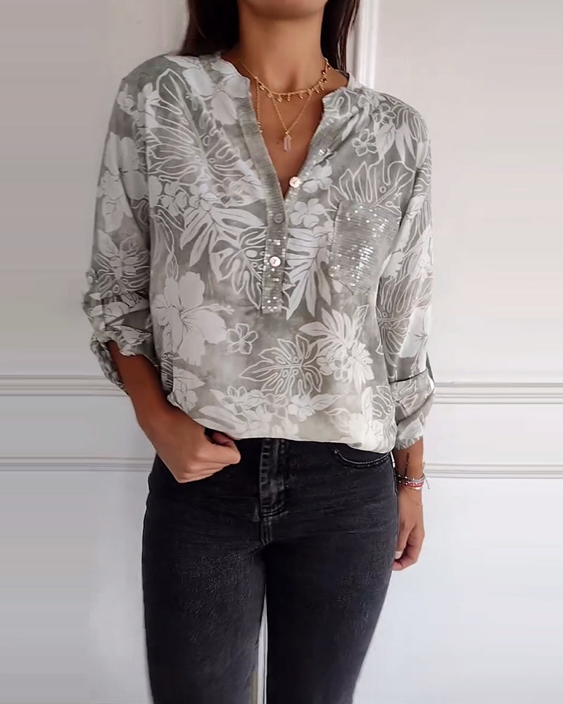 Top met bladprint en patchwork-pailletten