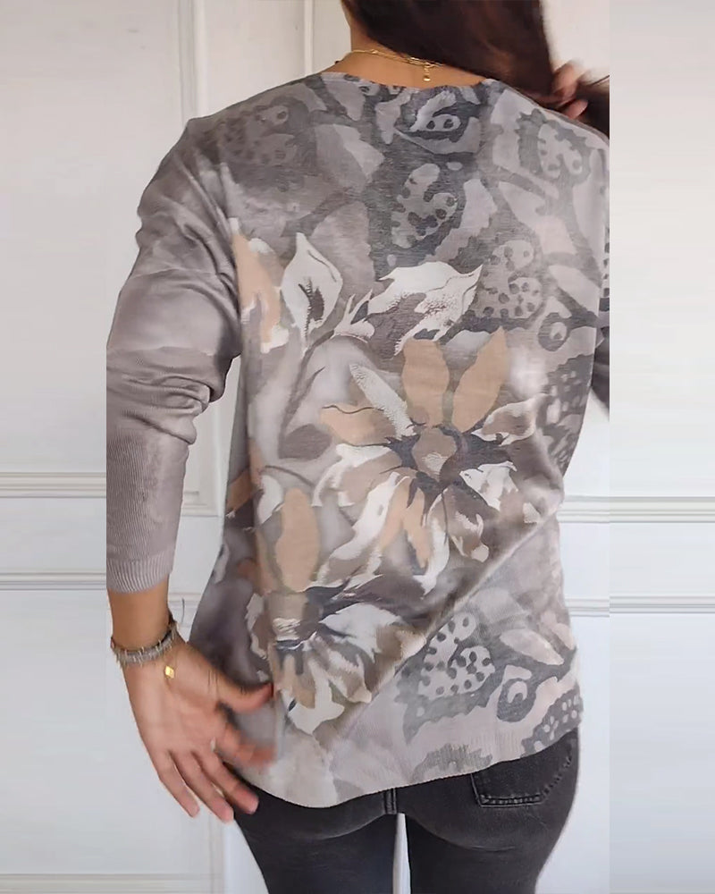 Vintage top met V-hals en lange mouwen met bloemenprint