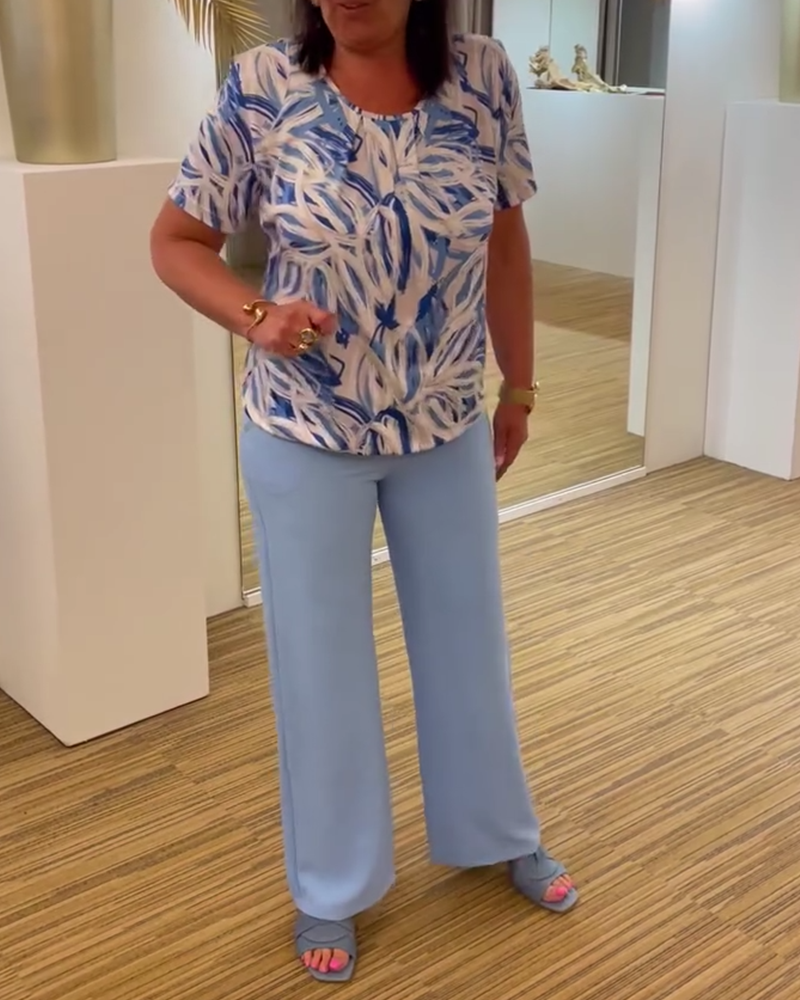 Geplooide blouse met korte mouwen en ronde hals met print