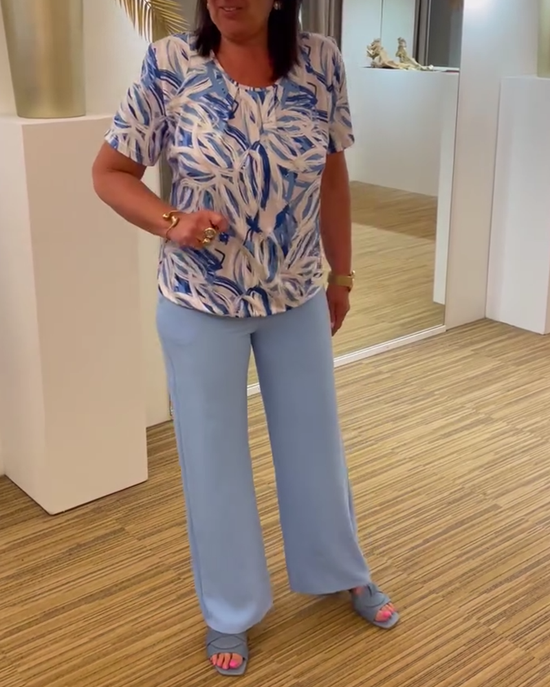 Geplooide blouse met korte mouwen en ronde hals met print