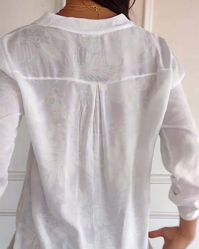 Top met bladprint en patchwork-pailletten