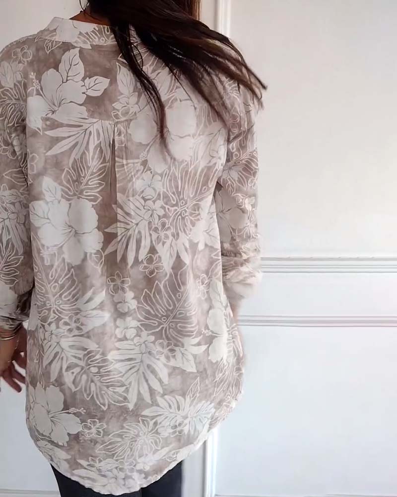 Top met bladprint en patchwork-pailletten