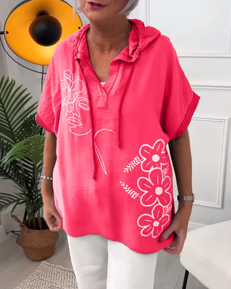Casual blouse met korte mouwen en bloemenprint met capuchon